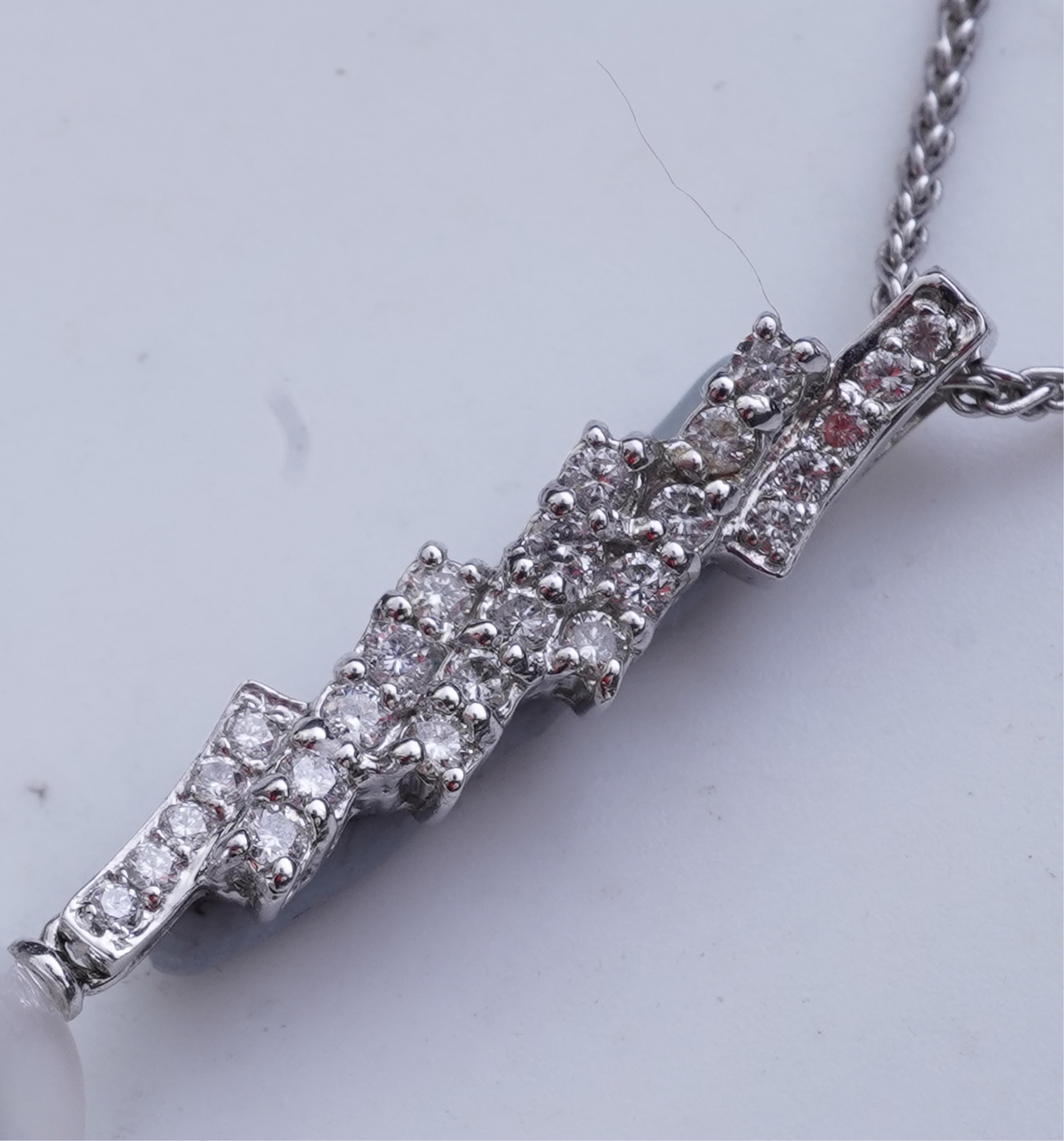A cultured pearl and diamond demi-parure